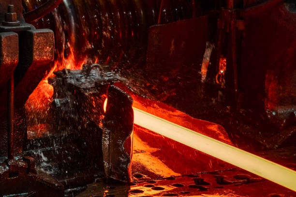 istock The rolling mill in operation. The hot metal is rolled through cooled rollers 1368297758