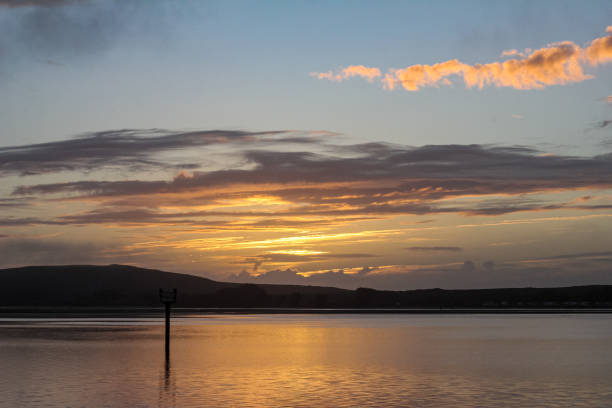 istock Watching the sunset in Bodega Bay in Northern California 1368299375