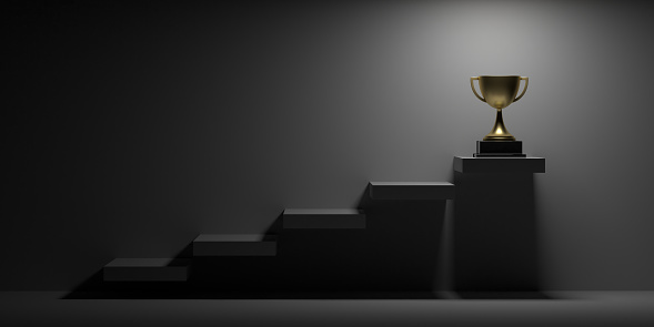 Victory concept: Illuminated 3D realistic golden cup with pedestal on rising steps under spotlight. Round winner Championship trophy. Sports tournament award background with copy space. Appreciate and celebrate Mother's Day or Father's Day. Best Team member trophy. First place.