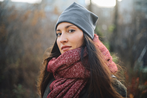 Young woman wearing a winter hat in Berlin.
