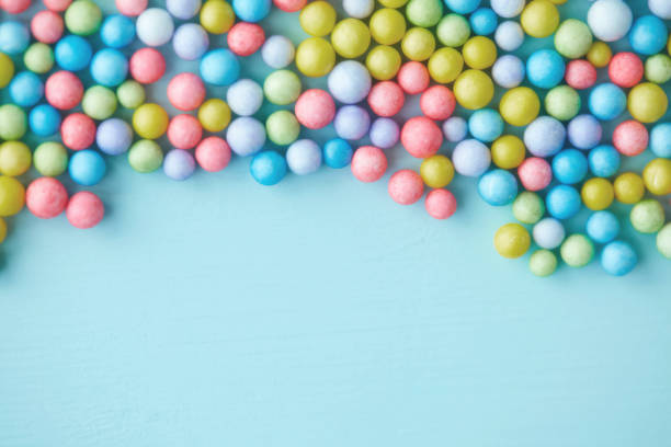 istock Abstract background with a collection of tiny colored balls. Conceptual business image to show population explosion or collaboration 1368306050