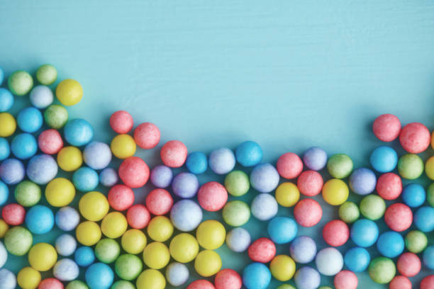 istock Abstract background with a collection of tiny colored balls. Conceptual business image to show population explosion or collaboration 1368306061