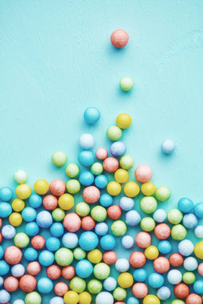 Abstract background with a collection of tiny colored balls. Conceptual business image to show population explosion or collaboration