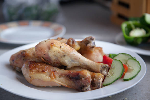 A plate of freshly cooked chicken legs