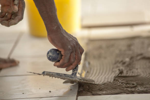 istock Floor Tile Fitter In The Caribeean 1368312446