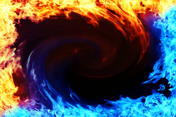 istock Background image of blue and red flames facing each other 1368318461