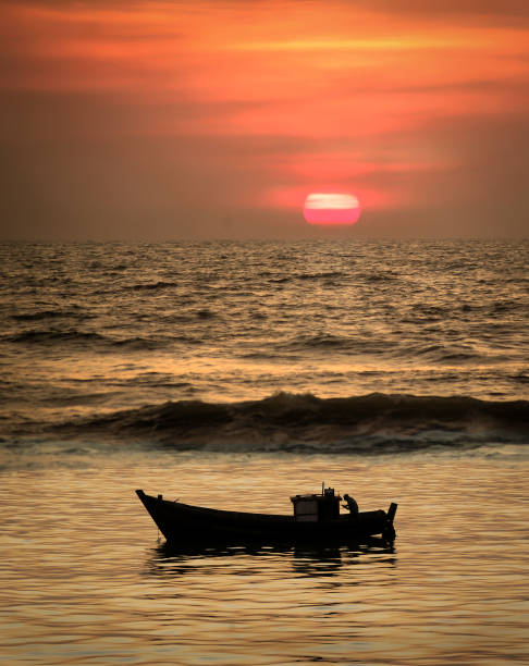 Tranquil sunset at Colva beach near Madgaon, South Goa, India