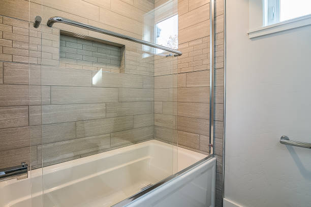 istock Glass enclosed shower and tub 1368333877