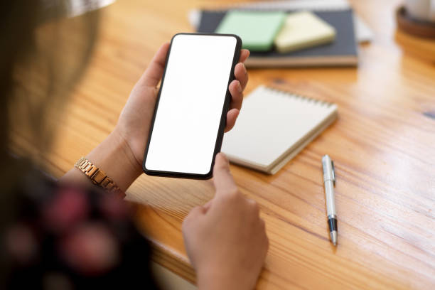 istock A mockup of white screen smartphone in woman's hand 1368334074