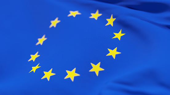 CLOSE-UP OF THE YELLOW STARS OF EUROPEAN UNION FLAG.