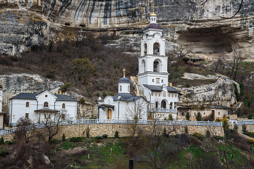 View of Assumption Cave Monastery in Bakhchysarai in spring. Crimea