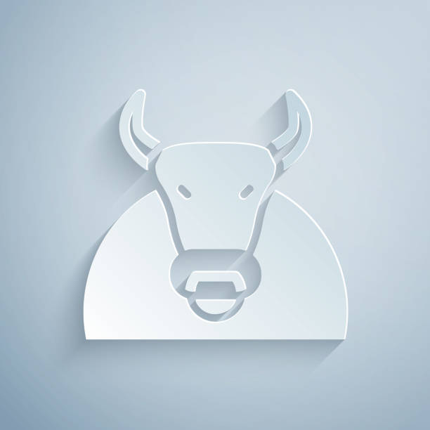 wycięta z papieru ikona byka izolowana na szarym tle. hiszpański byk walczący. papierowy styl artystyczny. wektor - texas longhorn cattle horned bull long stock illustrations