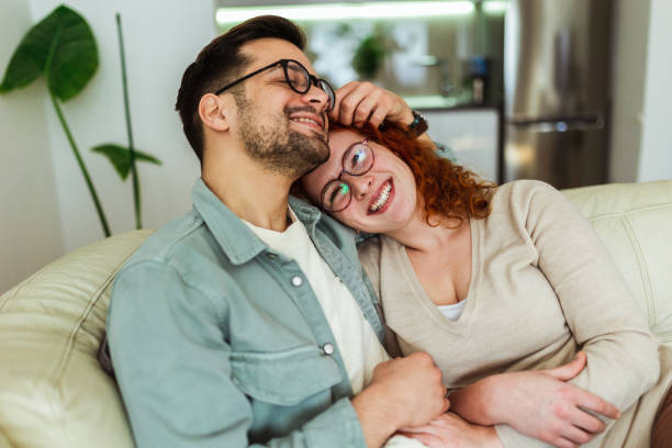 istock Young happy couple spending their time at home 1368337755