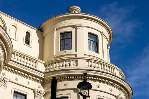 West Strand in City of Westminster, London. This is a commercial building, used for shops and offices, designed by John Nash and William Herbert in the 1830s.