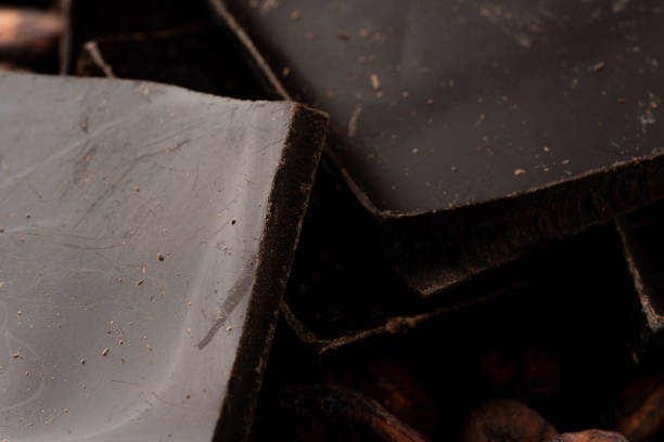 istock Chocolate bar and cocoa beans on white background 1368340838