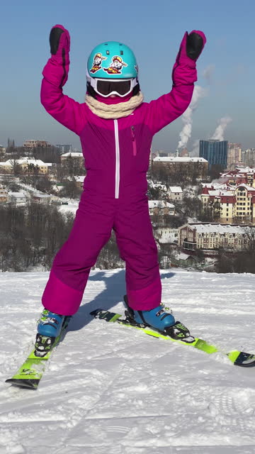 Portrait of the child in ski equipment.