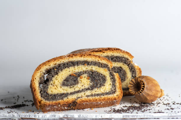 Slices of Poppy seed roll isolatet on white