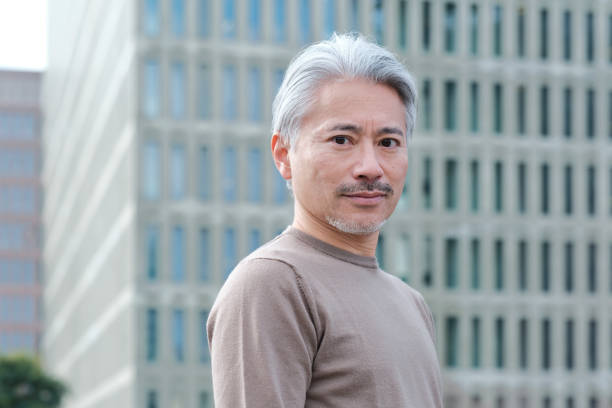 istock A Japanese man's headshot outdoors. 1368351399