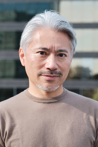 istock A Japanese man's headshot outdoors. 1368351404