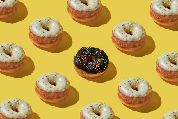 istock Doughnut repetition food background. 1368352546