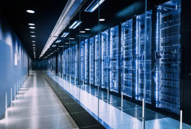 Photo of data center in server room with server racks