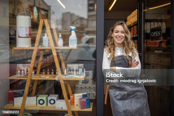 Proud Female Small Business Owner In Front Of The Store Stock Photo - Download Image Now