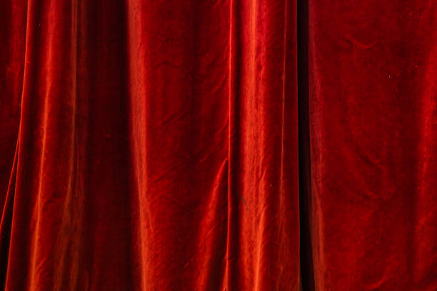 istock Red curtain in theatre. 1368360370