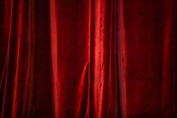 istock Red curtain in theatre. 1368360394