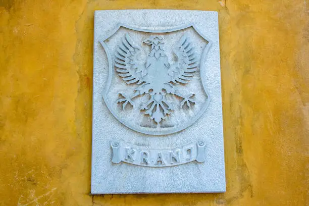 Photo of Coat of arms of Kranj, Slovenia on wall of City Hall