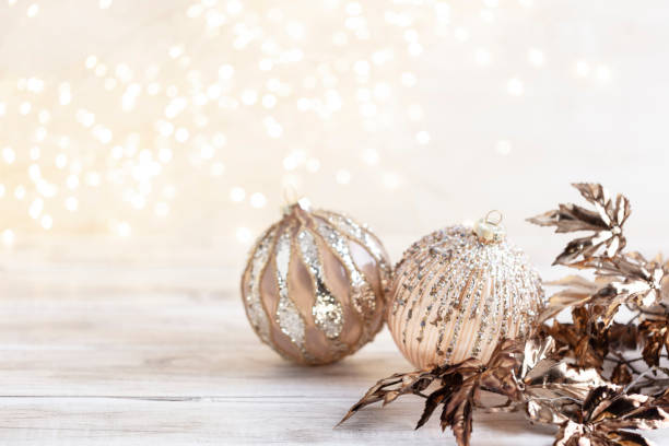 istock Golden christmas balls with bokeh. 1368362039