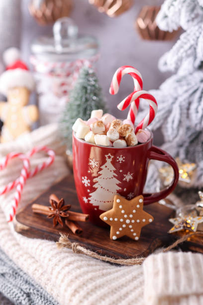 istock Christmas candy cane heart shape, bokeh background. 1368362628