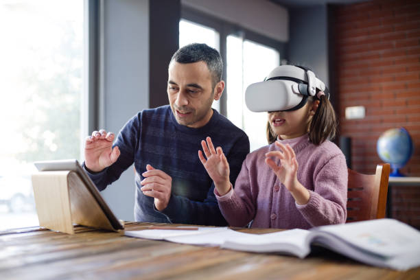 Father Assisting Her Daughter Doing Homework Via Metaverse