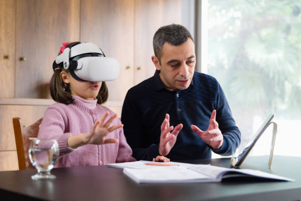 istock Father Assisting Her Daughter Doing Homework Via Metaverse 1368367811