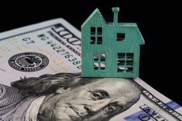 istock 100 American dollars on a black background 1368368301