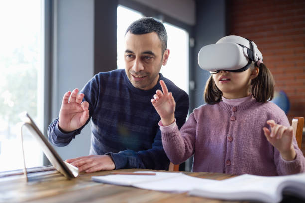 istock Father Assisting Her Daughter Doing Homework Via Metaverse 1368369466
