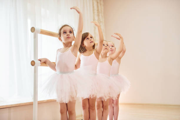 istock Conception of art. Little ballerinas preparing for performance 1368370047