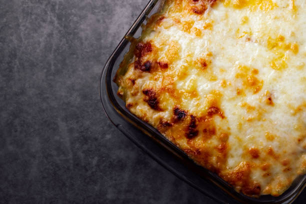 istock Homemade baked lasagna with copy space. 1368370477