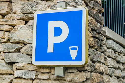 Sign indicating a parking zone with pay and display payment in Provence, France