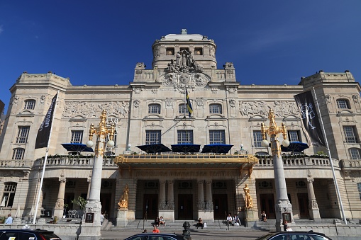 People visit Royal Dramatic Theatre (known as Dramaten) in Stockholm, Sweden. Stockholm is the capital city and most populous area in Sweden.