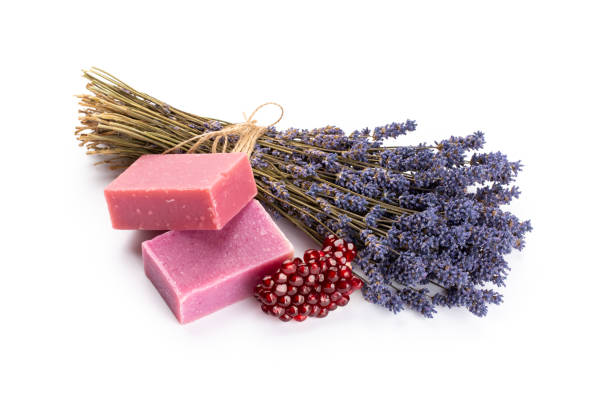 istock lavender spa products with pomegranate, lavender flowers on a isolated background. 1368372967