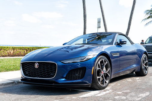 Palm Beach, Florida USA - March 21, 2021: New 2018 Jaguar F-TYPE luxury sports car blue color parked in palm beach, united states of america. front view. Jaguar F-TYPE
