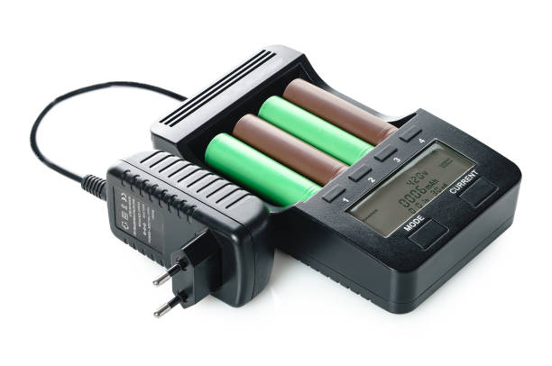 istock charger with batteries on a white isolated background 1368376455