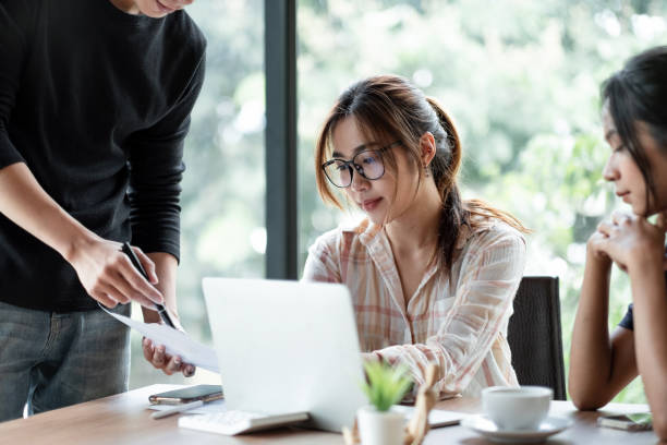 istock Business Asian people team discussing working analyzing with financial data and marketing growth report graph in team, presentation and brainstorming to strategy planning making profit of company 1368379889