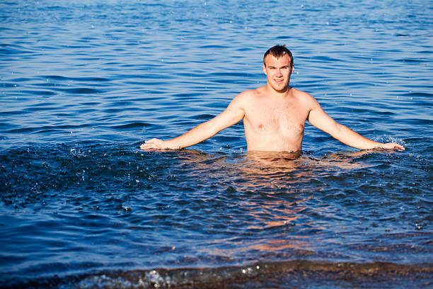 istock Young man relaxing in sea 136838199