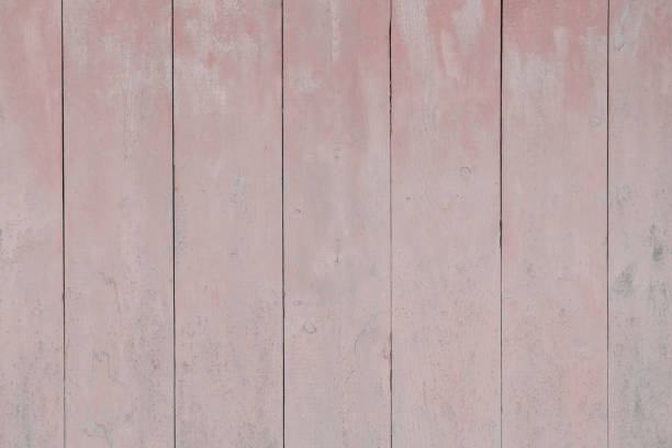 istock Old wooden pink boards. Close-up. Vertical view. Background. Texture. 1368384305
