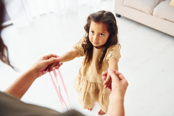 istock Mother and her daughter spending time together at home 1368384541