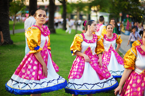 Lisbon, Portugal - June 12, 2014: Women dressed in traditional folmkklore costumes prepare to parade in Lisbon downtown during this city celebrations of the Popular Saints.