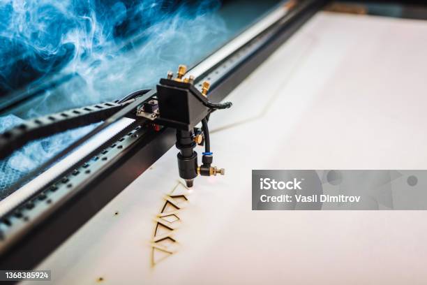 Plywood Laser Cutting Machine Close Up Stock Photo - Download Image Now - Laser, Cutting, Engraved Image