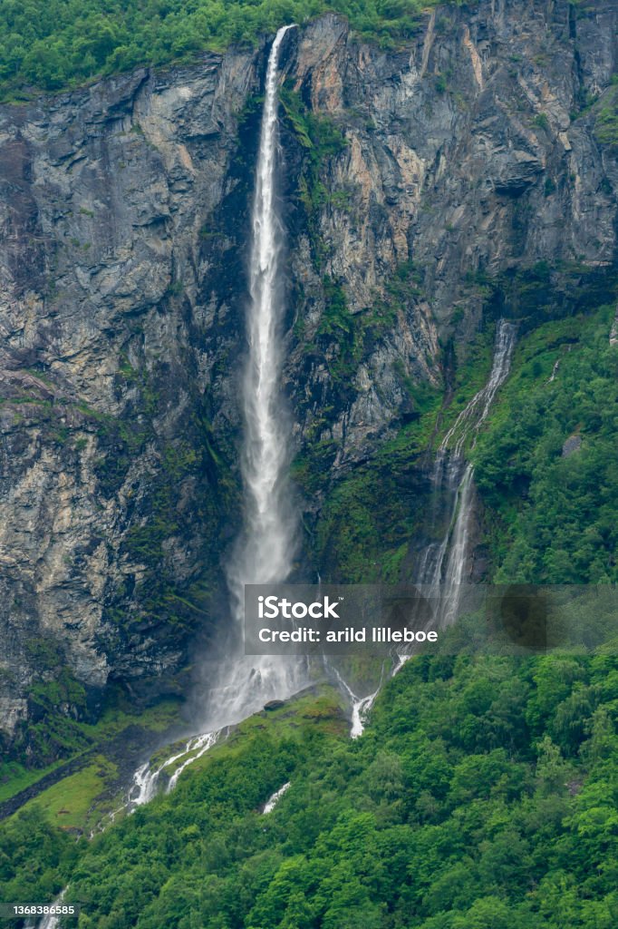 Gjerdefossen is one of the nicer waterfalls in the Geirangerfjord, the one closest to Geiranger. GEIRANGER, NORWAY - 2020 JUNE 21. Gjerdefossen is one of the nicer waterfalls in the Geirangerfjord, the one closest to Geiranger. Adventure Stock Photo