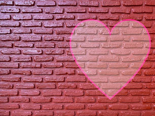 istock old brick wall graffiti heart, valentines day background 1368387378